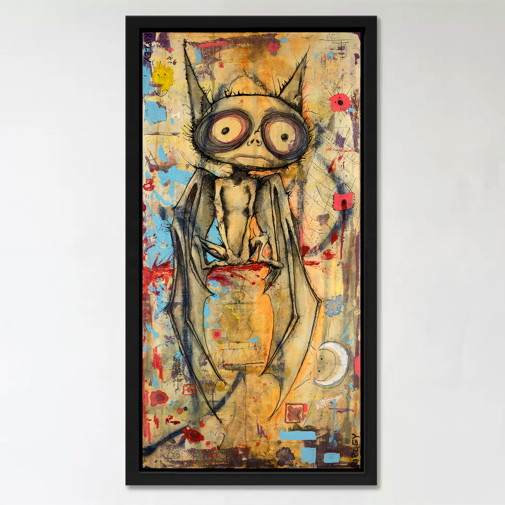 A framed vertical art print featuring a whimsical, hand-drawn bat character with large round eyes and a small orange pot, set against a textured multicolor background. The piece is housed in a simple black frame and displayed on a clean white wall.