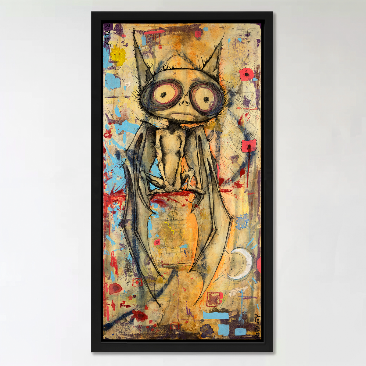 A framed vertical art print featuring a whimsical, hand-drawn bat character with large round eyes and a small orange pot, set against a textured multicolor background. The piece is housed in a simple black frame and displayed on a clean white wall.