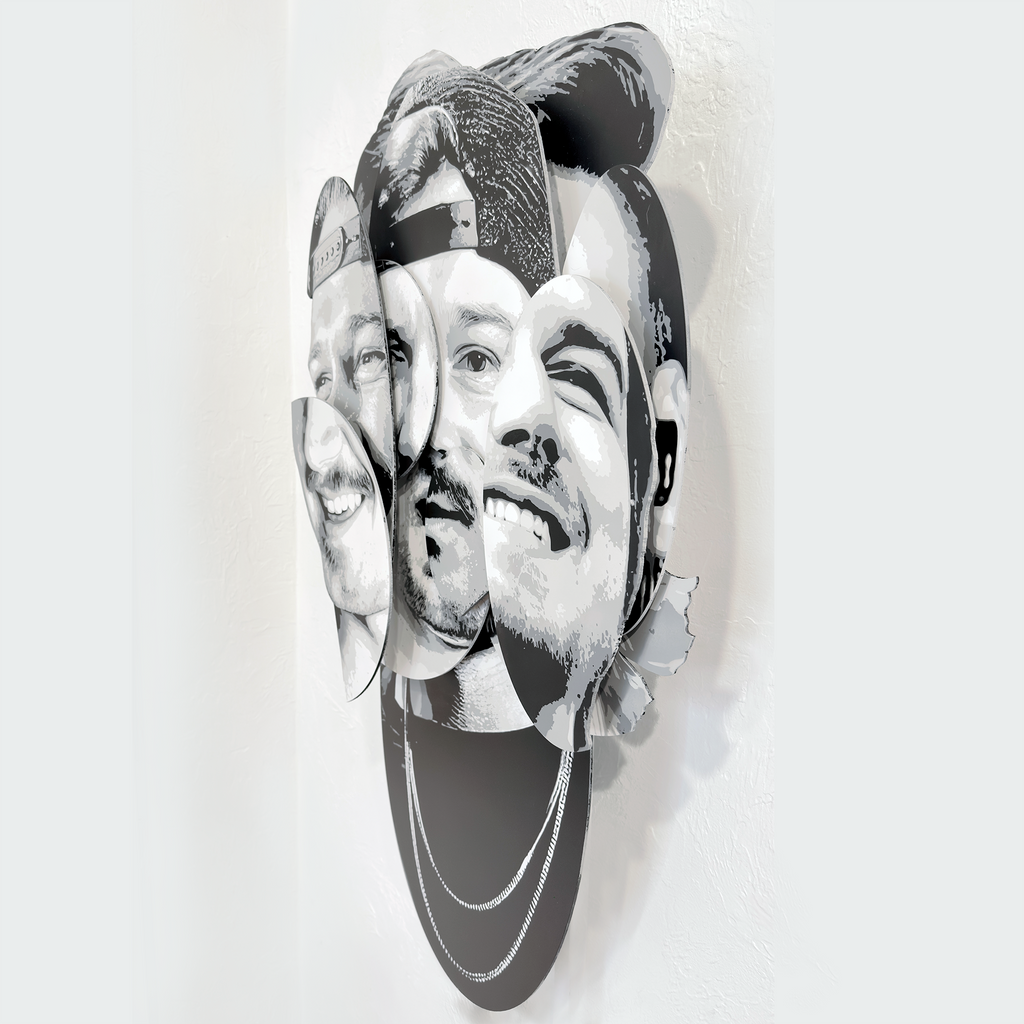 Parts of the Problem – dimensional spray paint artwork on layered wood by Ripley, inspired by Morgan Wallen, 41x24 inches. “Parts of the Problem by Ripley, a layered grayscale portrait of Morgan Wallen on a white gallery wall .”