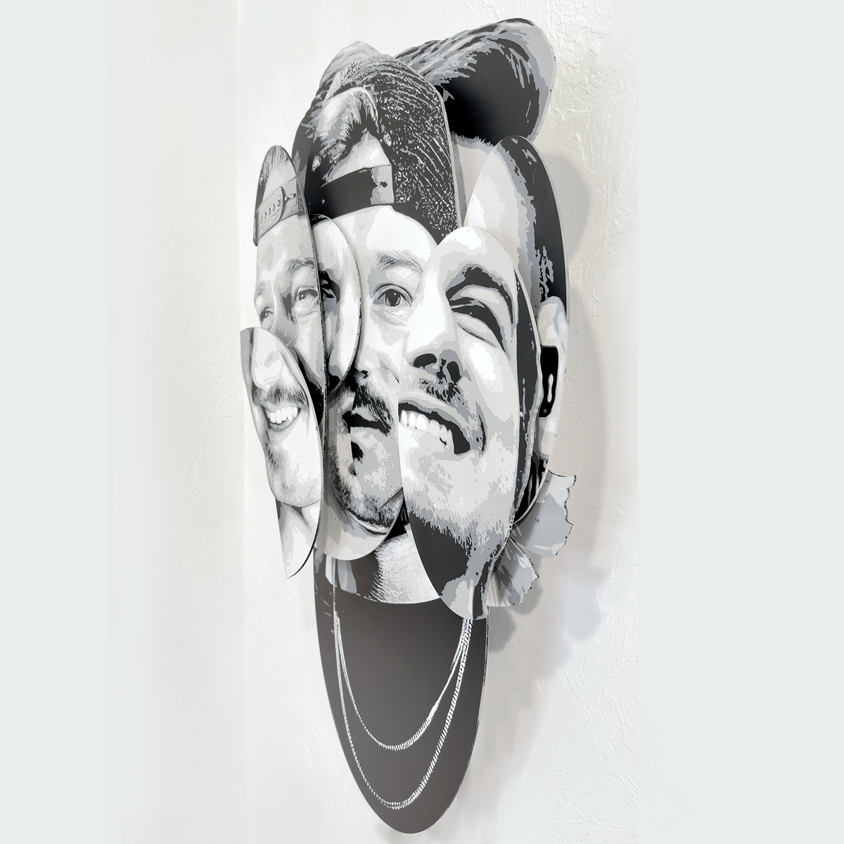 Parts of the Problem – dimensional spray paint artwork on layered wood by Ripley, inspired by Morgan Wallen, 41x24 inches. “Parts of the Problem by Ripley, a layered grayscale portrait of Morgan Wallen on a white gallery wall .”