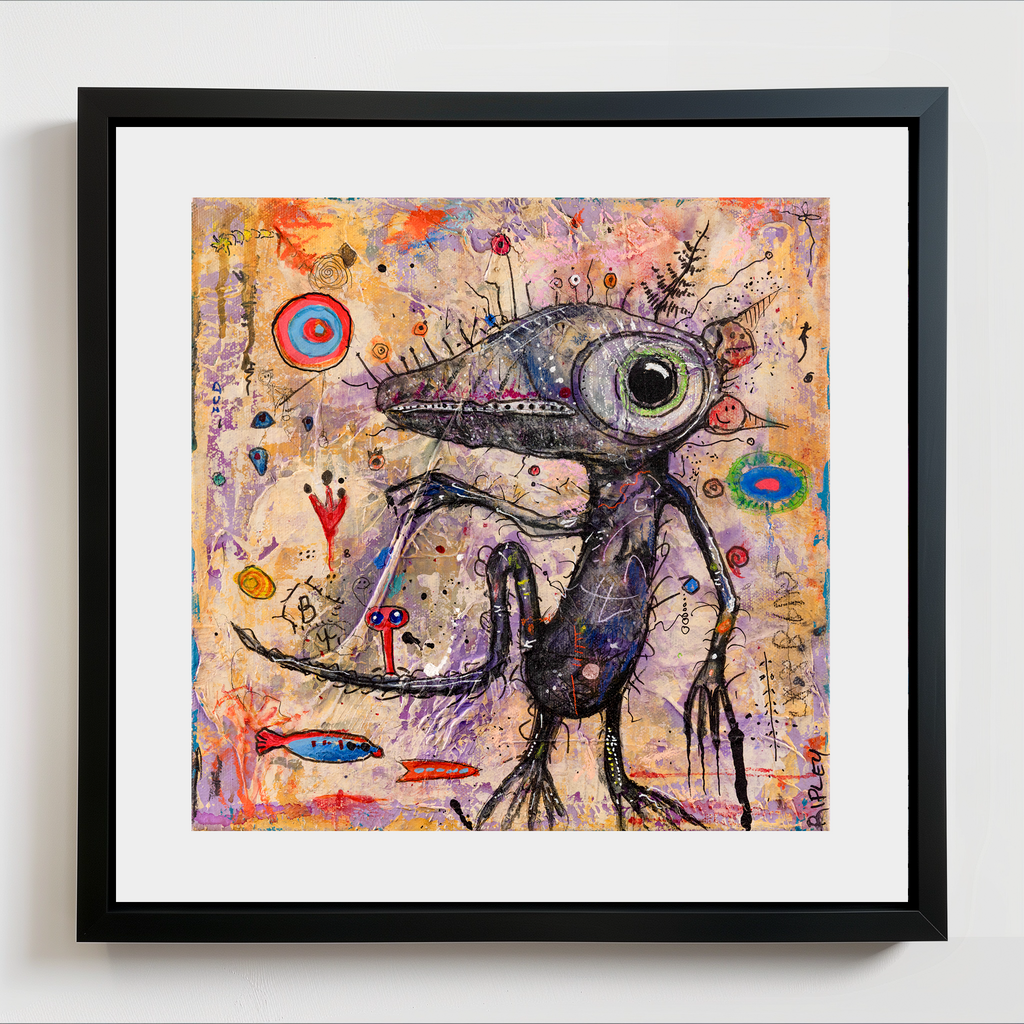 A framed abstract art print featuring a surreal, salamander in a black frame with a white mat, displayed against a light gray wall.